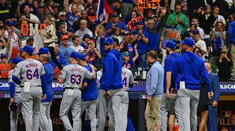 NY Mets ride emotional wave in defeating Brewers in Game 1 of .